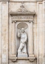 Statue of Saint Francis on the front of the Chiesa di San Francesco d`Assisi, Piazza della Liberta, Ostuni, Italy Royalty Free Stock Photo