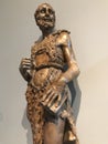 A Statue of Saint John the Baptist in his traditional rough garb