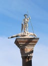 Statue in the Saint Mark Square in Venice with the San Teodoro a Royalty Free Stock Photo