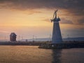 Statue of Saint Nicholas the patron of sailors, in the old town of Nessebar, Burgas, Bulgaria. Sunset scene at the coastline with