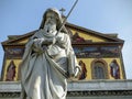 Statue of Saint Paul in front of the basilica of Saint Paul outside the walls to Rome in Italy.