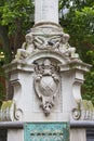 Statue of Saint Paul next to the St Paul Cathedral, bas-relief on the pedestal, London, United Kingdom.