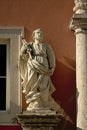 Statue of saint Peter holding the keys of heavenand a holy book with the gospel