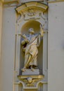 Statue of Saint Peter holding the keys to heaven on the facade of the Basilica of Saint Margaret of Antiochia