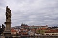 The statue of saints on the Charles Bridge with Prague Castle in the background Czech Republic Royalty Free Stock Photo