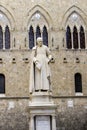Statue of Sallustio Bandini at Piazza Salimbeni in Siena Royalty Free Stock Photo