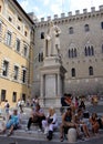 Statue of Sallustio Bandini 1677 - 1760, a priest and one of the first Italian economists, at Piazza Salimbeni, Siena, Italy Royalty Free Stock Photo