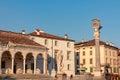 Udine - Statue of San Marco lion on top of column and Hercules in front of Loggia del Lionello