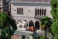 Udine - Statue of San Marco lion on top of column and Hercules in front of Loggia del Lionello