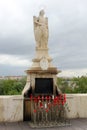 Statue of San Rafael in the Roman bridge