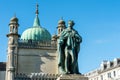 The statue scene of King George IV in front of the entrance of Brighton Pavilion near by the Royalty Free Stock Photo