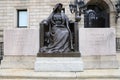 Statue at the entrance of Boston Public Library