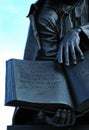 Statue and Scripture Royalty Free Stock Photo