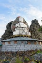 Seated Buddha in Shad Tchup Ling Buddhist monastery on mountain Kachkanar. Russia