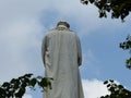 Statue seen from behind of Leonardo da Vinci to Milan in Italy.