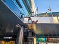 A statue of Shaquille O\'Neal dunking a basketball a Lakers uniform in front of Crypto.com Arena in Los Angeles California