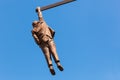 Statue of Sigmund Freud hanging by one hand in Prague, Czech Republic.