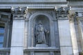 Statue of Sir Richard Whittington, Royal Exchange facade in London, England Royalty Free Stock Photo