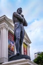 Statue of Sir Stamford Raffles statue in front of the Victoria Theatre and Concert Hall, Singapore. Royalty Free Stock Photo