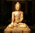 Statue of sitting golden Buuddha