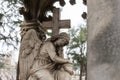 Statue of a sleeping angel in an old cemetery Royalty Free Stock Photo