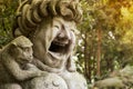 Laughing happy woman sculpture with monkey in Ubud