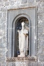 Statue of St Blaise on the wall of old town Dubrovnik