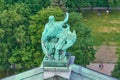 Statue of St. John with an eagle on the roof of St. Isaac`s Cathedral in St. Petersburg