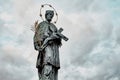 Statue of St. John of Nepomuk on the Charles bridge in Prague, Czech republic Royalty Free Stock Photo