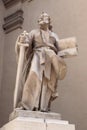 Statue of St. Paul with a sword and a book. White limestone