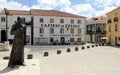 Statue of St. Peter, local specialty pastry shop Pasteis de Feijao, Torres Vedras, Portugal