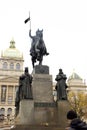 The statue of St Wenceslas in Wenceslas Square in Prague and behind the National museum