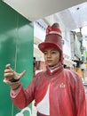 Statue on the street wearing uniform