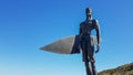 Statue of a surfer in the beach of Ribeira d'Ilhas World Surf Reserve. Ericeira in Portugal. October 04, 2018 Royalty Free Stock Photo