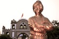 The statue of Swami Vivekananda which is located in Dewas city, famous sayaji gate of dewas city in the background Royalty Free Stock Photo