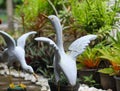 statue of a swan looking for food in the garden Royalty Free Stock Photo