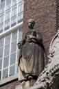 Statue of 18th century woman on Meisjeshuis Delft