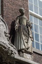 Statue of 18th century woman on Meisjeshuis Delft