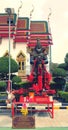 Statue of Thao Wessuwan for worship and faith in sacredness with ancient church in Thai temples