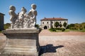 Zolochiv, Ukraine - July 23 2009: Statue of three boys in the garden of the castle in Zolochiv, Ukraine