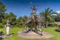 Statue of three headed elephant and warrior deity, Xieng Khuan Buddha Park, Vientiane, Laos