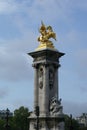 Statue on top of a pillar of Pont Alexandre III. Paris Royalty Free Stock Photo