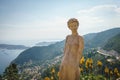 The statue on the top of the town of Eze village on French Riviera Royalty Free Stock Photo