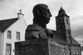 Statue and Townhouse Royalty Free Stock Photo