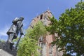 statue of troelstra next to oldehove tower in the centre of leeuwarden in the netherlands