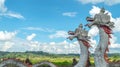 Statue of twin dragon with beautiful sky as the background in Pulau Kumala, Indonesia