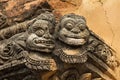 Statue of two faces on the ancient temple