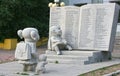 Statue of a two school kids and big book. Royalty Free Stock Photo