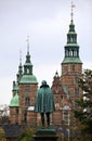 Statue of Tycho Brahe looking towards the renaissance castle Rosenborg in Copenhagen. The castle was build 23 years after Tycho's Royalty Free Stock Photo