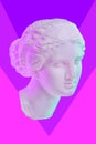 Statue of Venus de Milo. Creative concept colorful neon image with ancient greek sculpture Venus or Aphrodite head